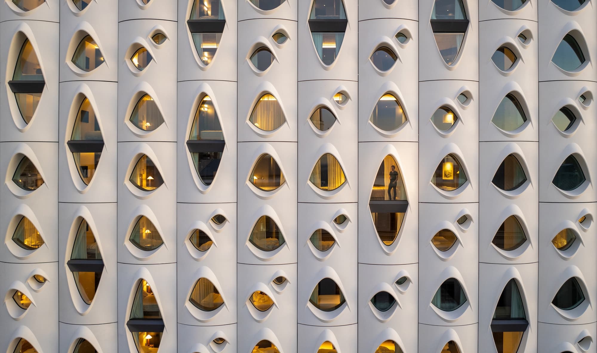 Populus Denver's tree-inspired facade in downtown Denver at dusk
