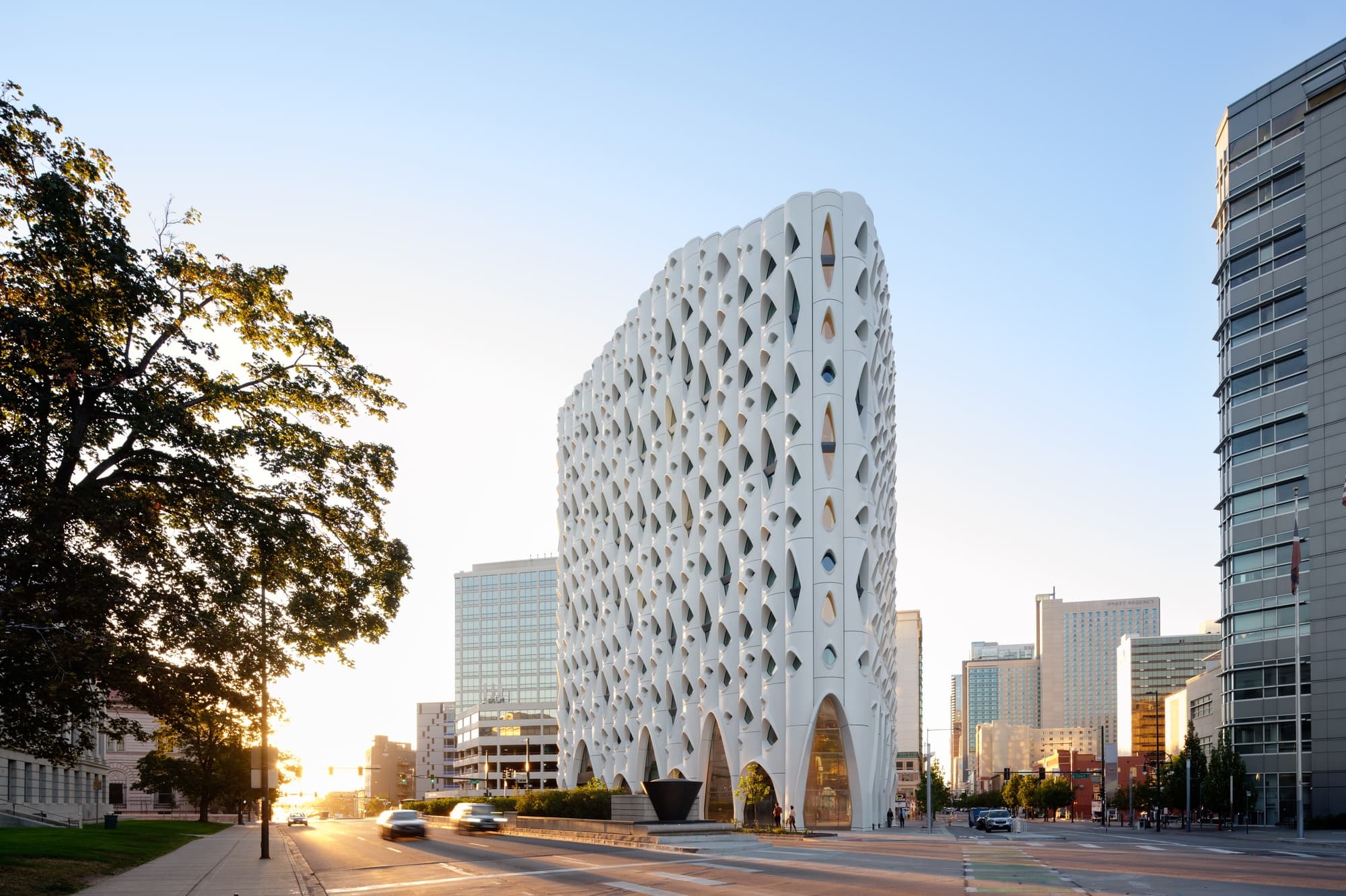 Populus Denver's tree-inspired facade in downtown Denver at dusk